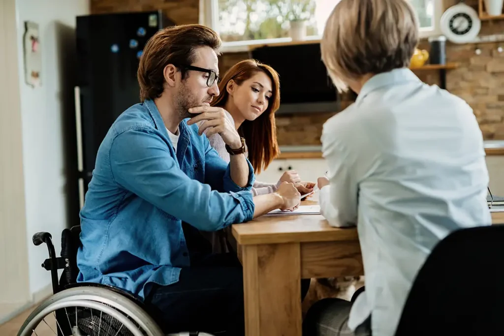 Young couple consulting with their lawyer